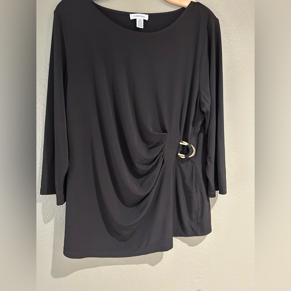 Black flowy top with buckle on side. Size XL